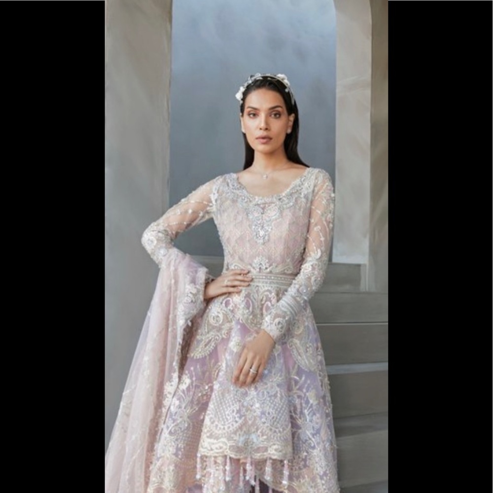 - Pakistani designer dress pink color Net Embroidered